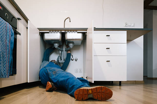 Professional Emergency Plumber technician working in Elmira, NY